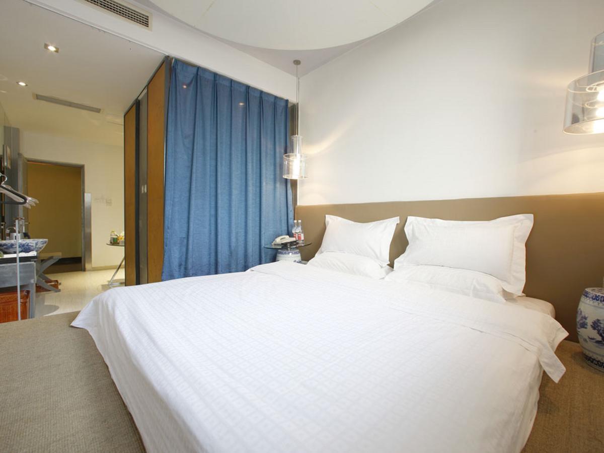 China Community Art Habitat Hotel Qingdao Kamer foto